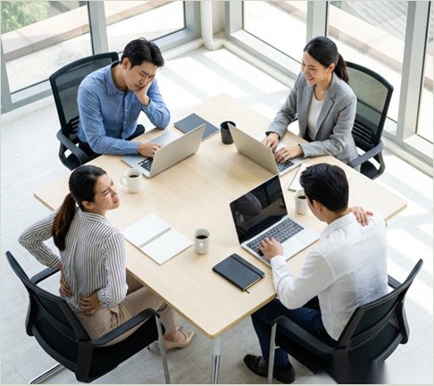Office team working at a meeting table